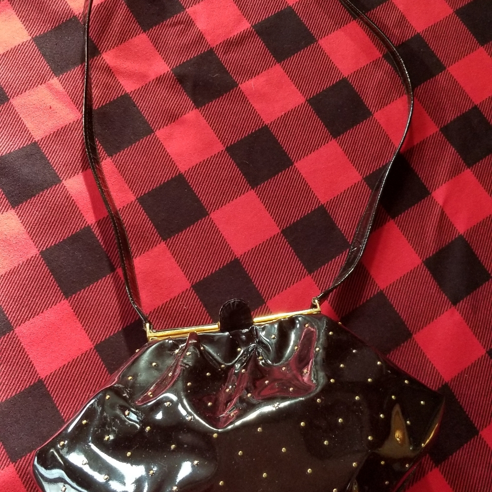 Stuart Weitzman patent leather crossbody with gold